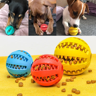 Rubber feeder dog ball toy with snacks inside for pet play and dental care.