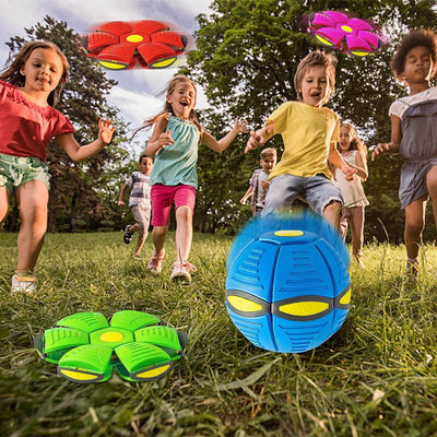 Children playing with Magic UFO Jumping Ball toy in various colors outdoors.