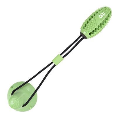 Green suction cup molar chewing toy for pets, olive-shaped with 360-degree tooth cleaning spikes.