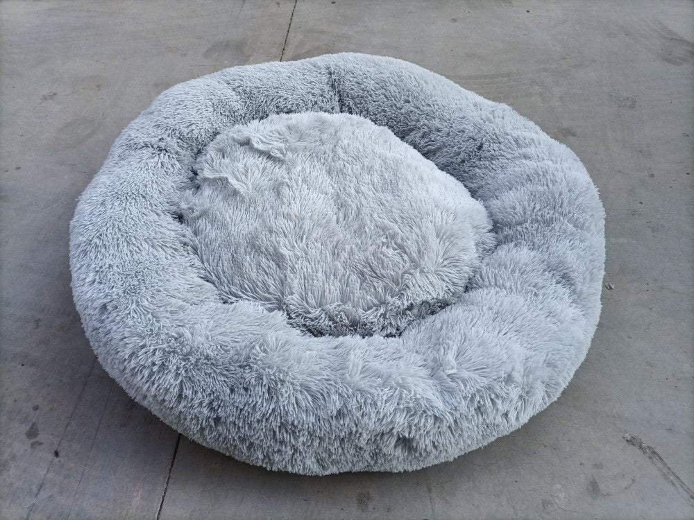 Non-slip pet cushion with fluffy, round design, wear-resistant and moisture-proof.