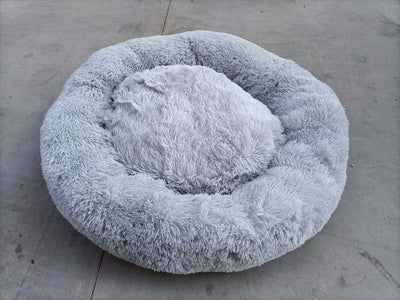 Non-slip pet cushion with fluffy, round design, wear-resistant and moisture-proof.