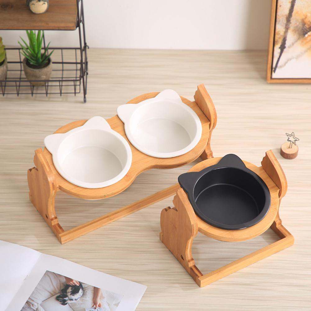 Wooden pet cat food bowl with ceramic dishes and stand, ideal for cats.