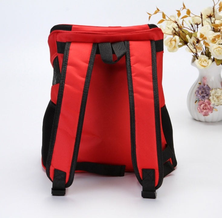 Red Premium Breathable Pet Backpack with adjustable straps and medium to soft hardness.