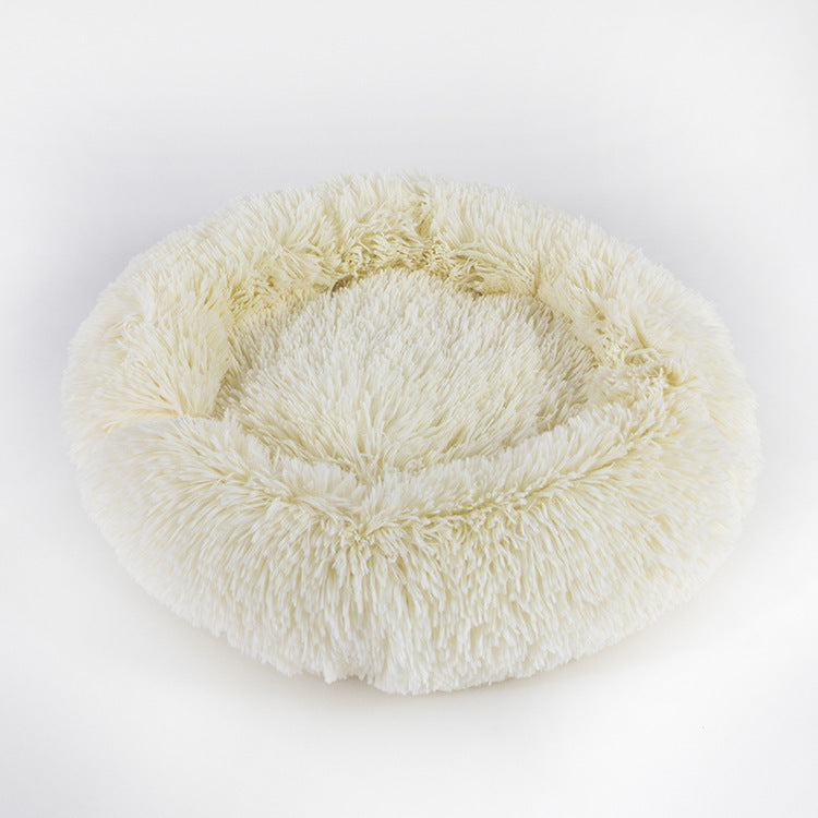 Non-slip pet cushion with fluffy soft plush, wear-resistant and waterproof design.