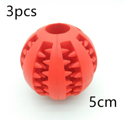 Red rubber feeder dog ball toy, 5cm size, tooth cleaning design.