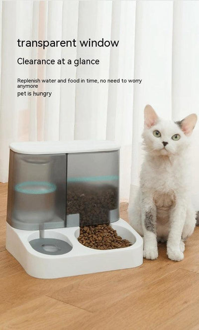 Visual Automatic Pet Feeder with food and water compartments next to a white cat.