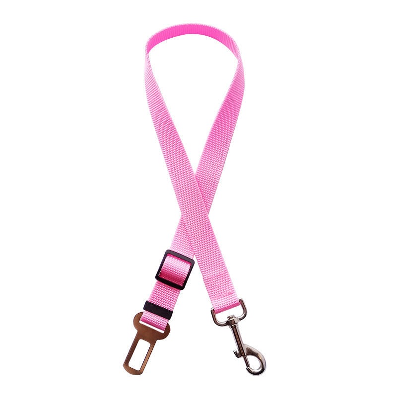 Pink pet retractable car seat belt with adjustable strap and buckle.