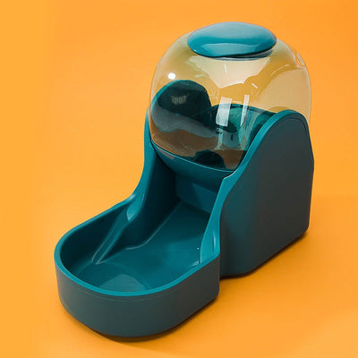 Automatic drinking fountain feeder in green for pets with large reservoir and spill-resistant design.