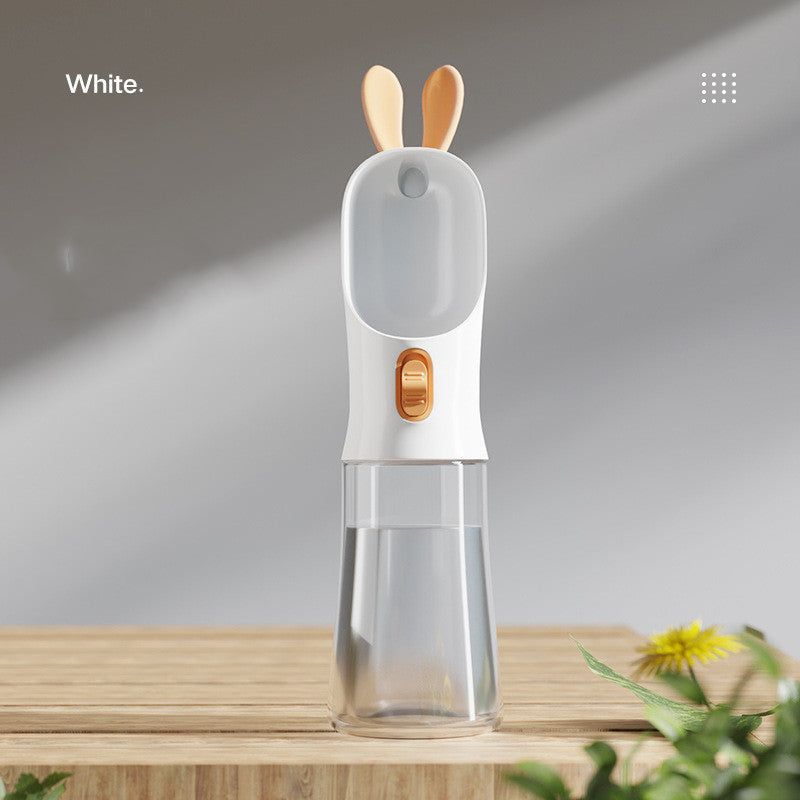 White portable pet travel water bottle with bunny ears and silicone design for pet hydration.