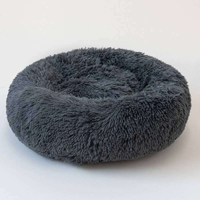 Round, grey, non-slip pet cushion with anti-skid design, fluffy and moisture-proof.