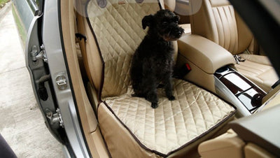 Waterproof pet seat thickening pad protecting car seat with adjustable straps.