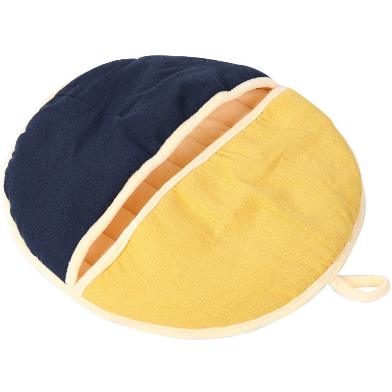 Semi enclosed pet nest in navy and yellow, made of cotton and linen, 55 x 60 cm.