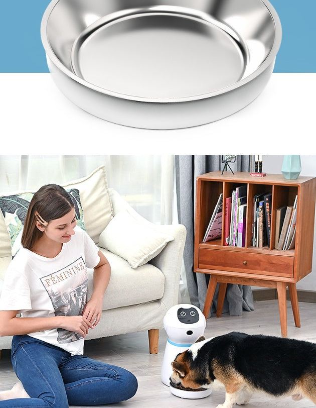 Automatic pet feeder with metal food tray, easy to clean, feeding a dog.