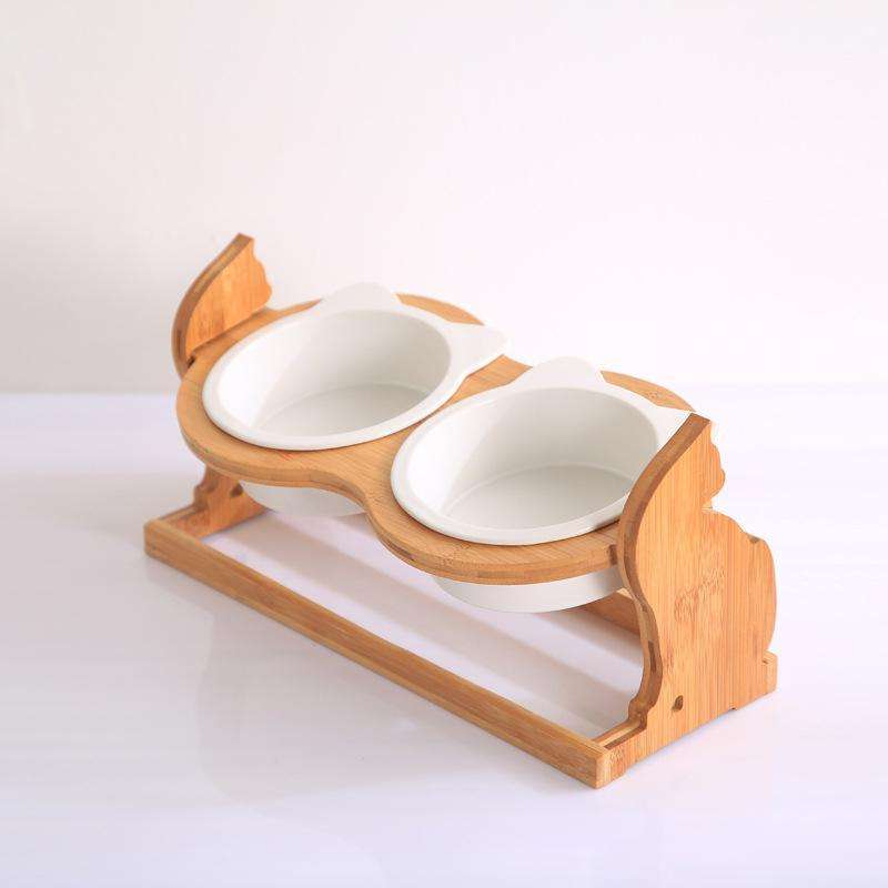 Wooden pet cat food bowl with double ceramic bowls and wooden stand.