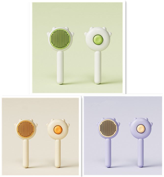 Cat Pet Magic Combs in green, yellow, and purple for hair removal and grooming.