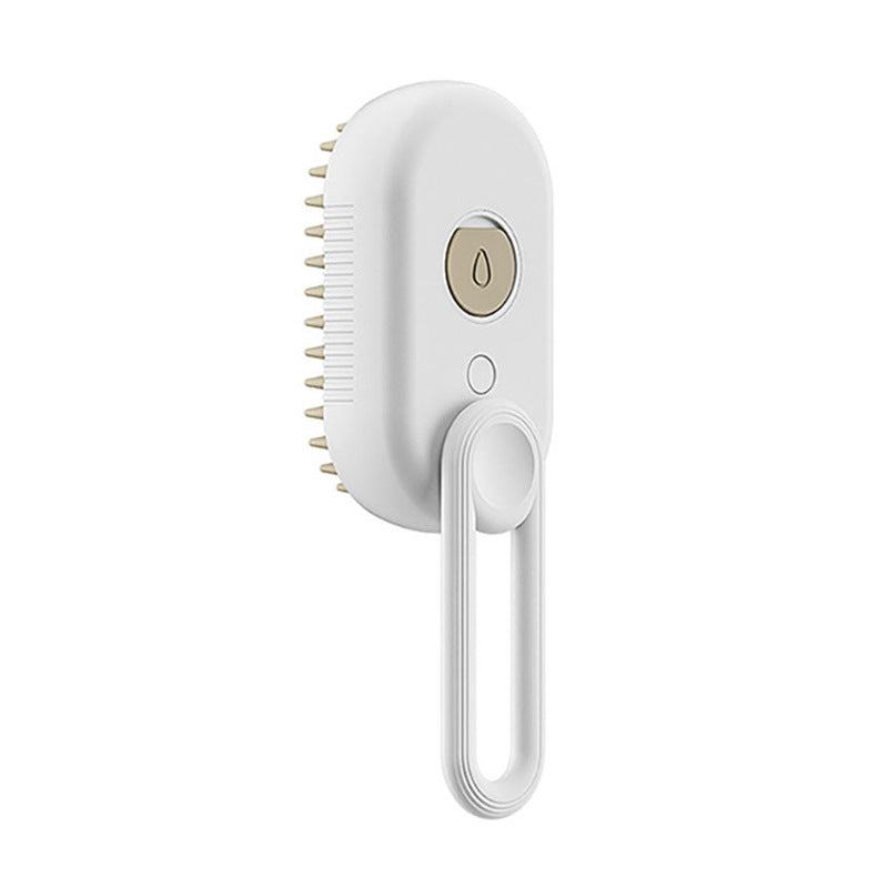 3-in-1 Electric Spray Cat Brush with ergonomic handle and silicone teeth in porcelain white.