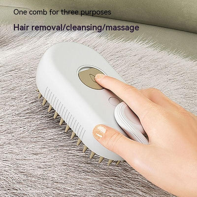 3 In 1 Electric Spray Cat Brush for hair removal, cleansing, and massage on pet fur.