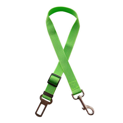 Green pet retractable car seat belt made of cloth material.